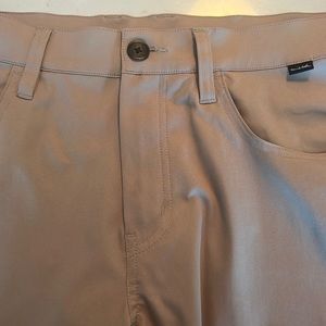 Travis Matthew’s golf pants tan, 33”